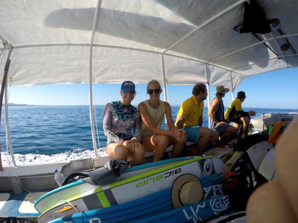 Heading out to Cloudbreak, boards on top and in the boat! Heading out to Cloudbreak, boards on top and in the boat!